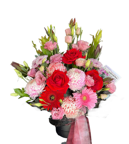 Pink and red colour roses and mums flower Arrangement